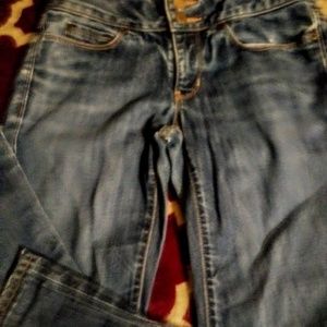 Boot cut 24 R mid rise jeans